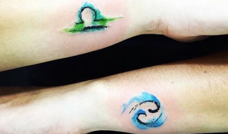 tatuagem aquarela de signos de libra e câncer
