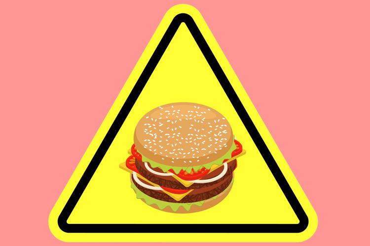 placa de triângulo com hamburguer desenhado no centro