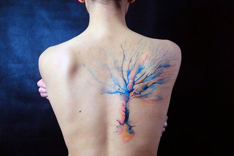 Tatuagem aquarela feminina: veja 60 ideias e inspirações! 