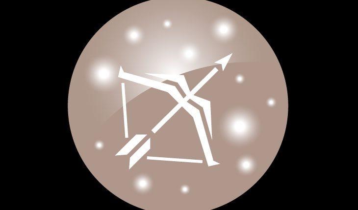 Na imagem há o símbolo do signo de Sagitário (arco e flecha) em branco em um fundo marrom-claro em formato circular.