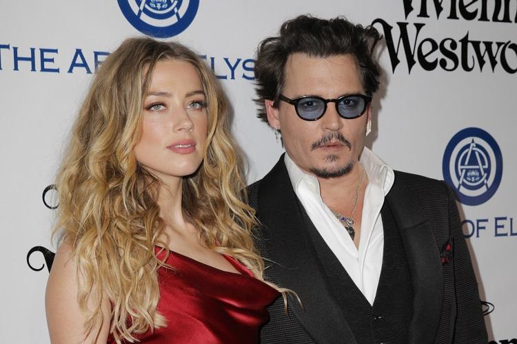 Amber Heard e Johnny Depp em premiação