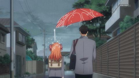 duas-pessoas-com-guarda-chuva-se-molhando