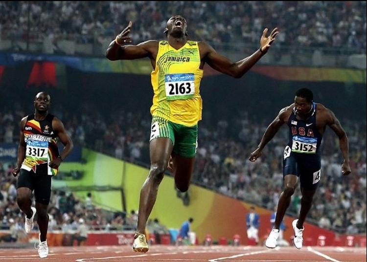 Fotografia de Usain Bolt ganhando prova olimpica