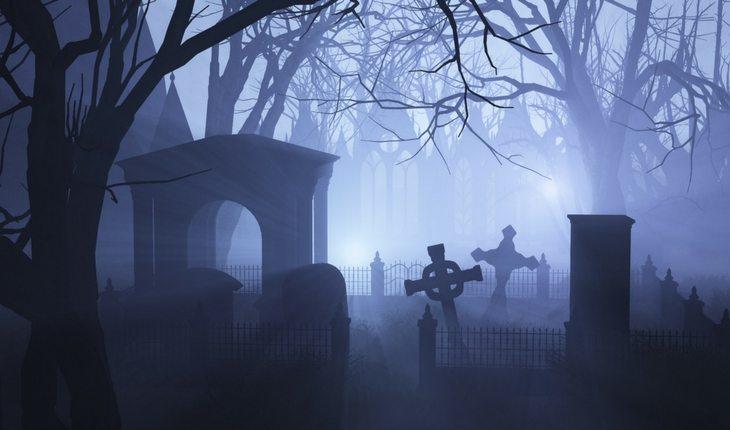 Cemitério à noite com túmulos