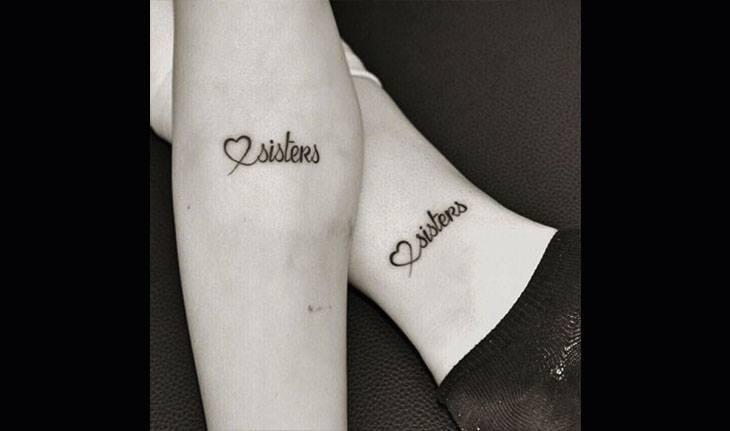 Tatuagens de irmãs com símbolos e frase