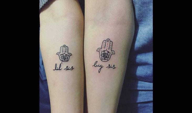 Tatuagens de irmãs com símbolos e frase