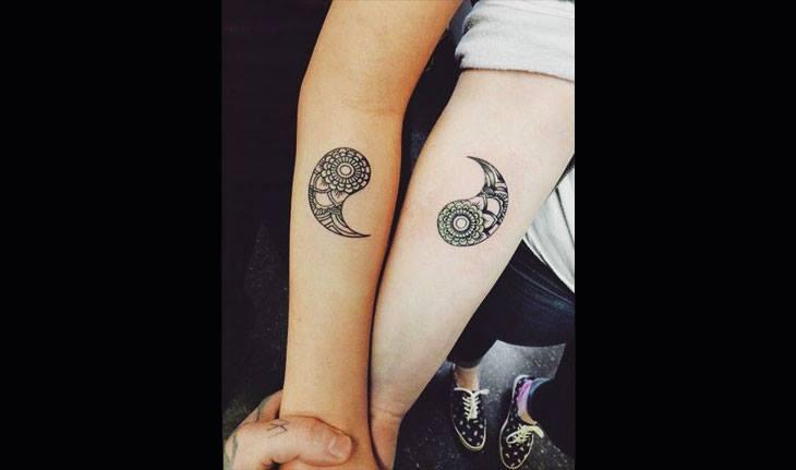Tatuagem de irmãs no braço