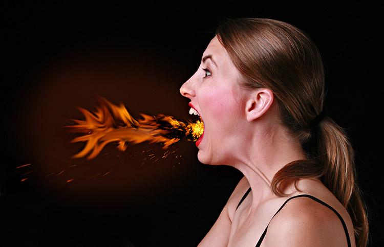 ilustração com fogo saindo da boca de uma mulher 