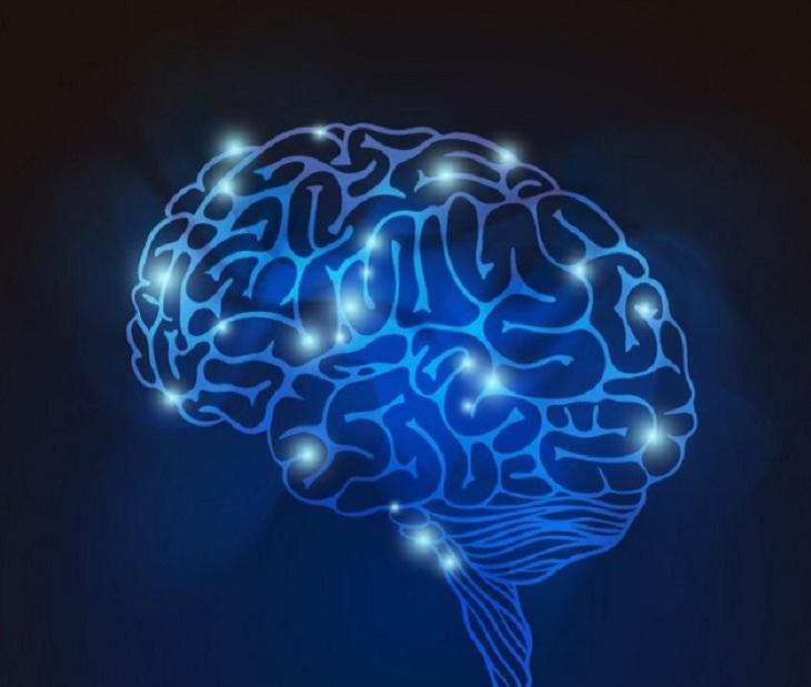desenho de um cérebro azul com pontos luminosos em várias partes