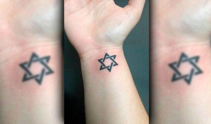 tatuagem mística com a imagem de uma estrela de seis pontas.