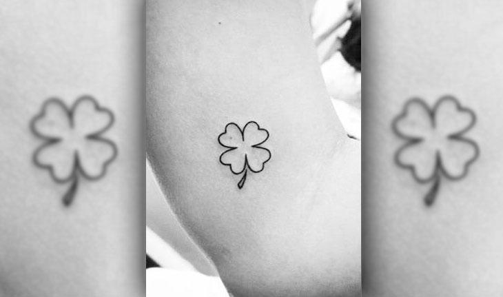 tatuagem mística com a imagem de um trevo de quatro folhas.
