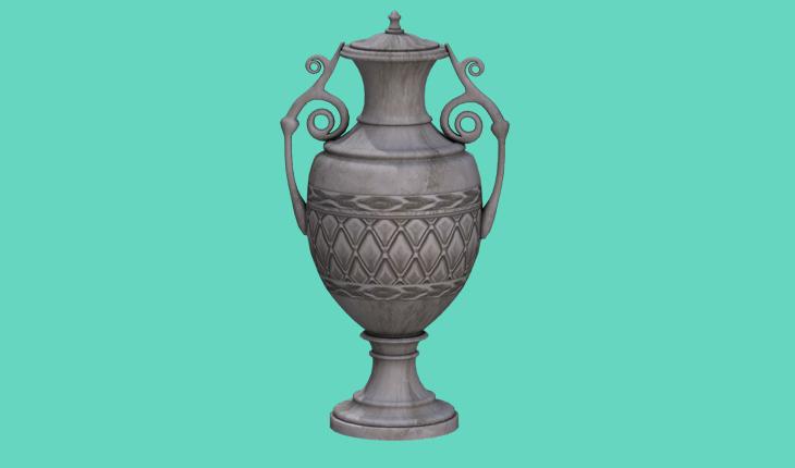 A foto mostra um vaso antigo ornamentado