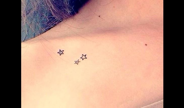 Tatuagem de estrelas em mulher