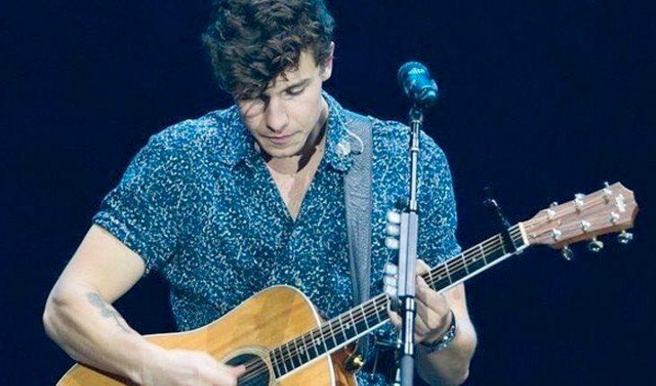Rock in Rio. Na foto, Shawn Mendes tocando violão