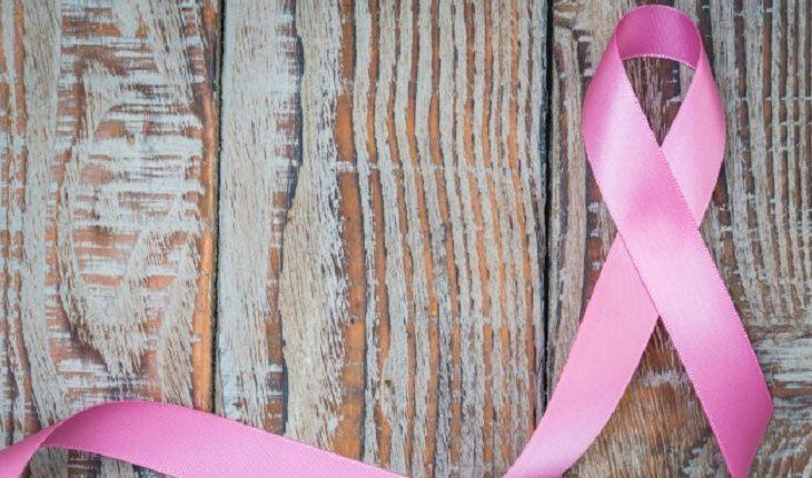 Na imagem, uma fita rosa indica a luta contra o câncer de mama. Problemas ginecológicos.