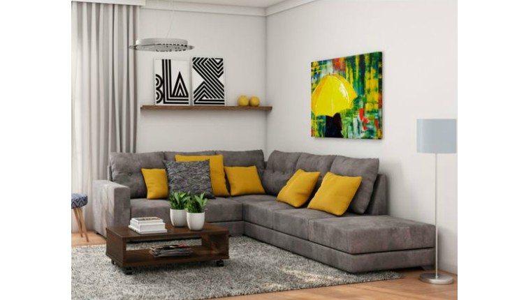 Sala com sofá de canto e almofadas amarelas