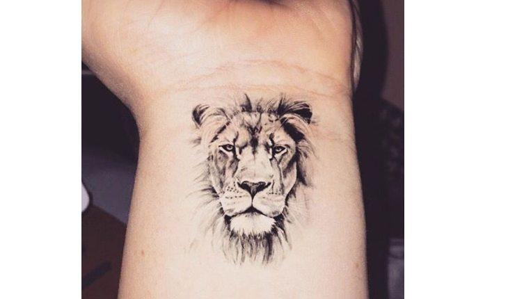 tatuagem de rosto de leão