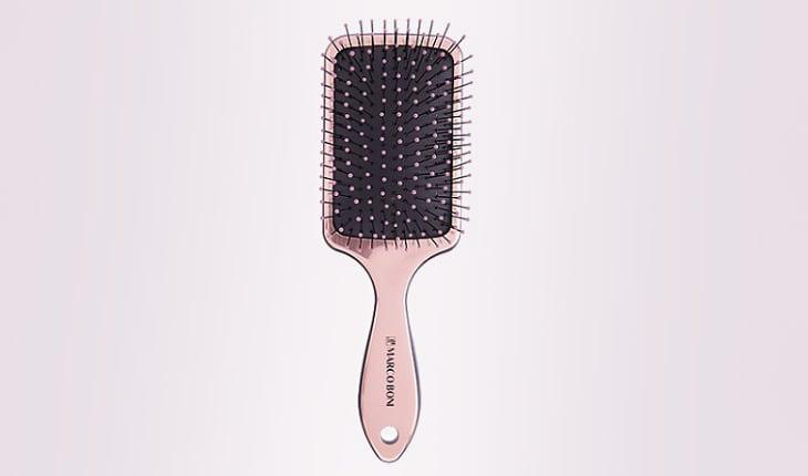 escova de cabelo modelo raquete
